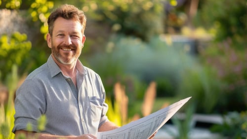 Landscape designer working on project for residential landscape preparation.